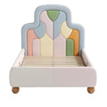 **Technische Titel in het Nederlands:** **Moderne kinderbed met kleurrijk gestoffeerde hoofdeinde**